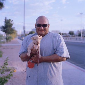 man-with-puppy-fremont-st-summer09-web-play2